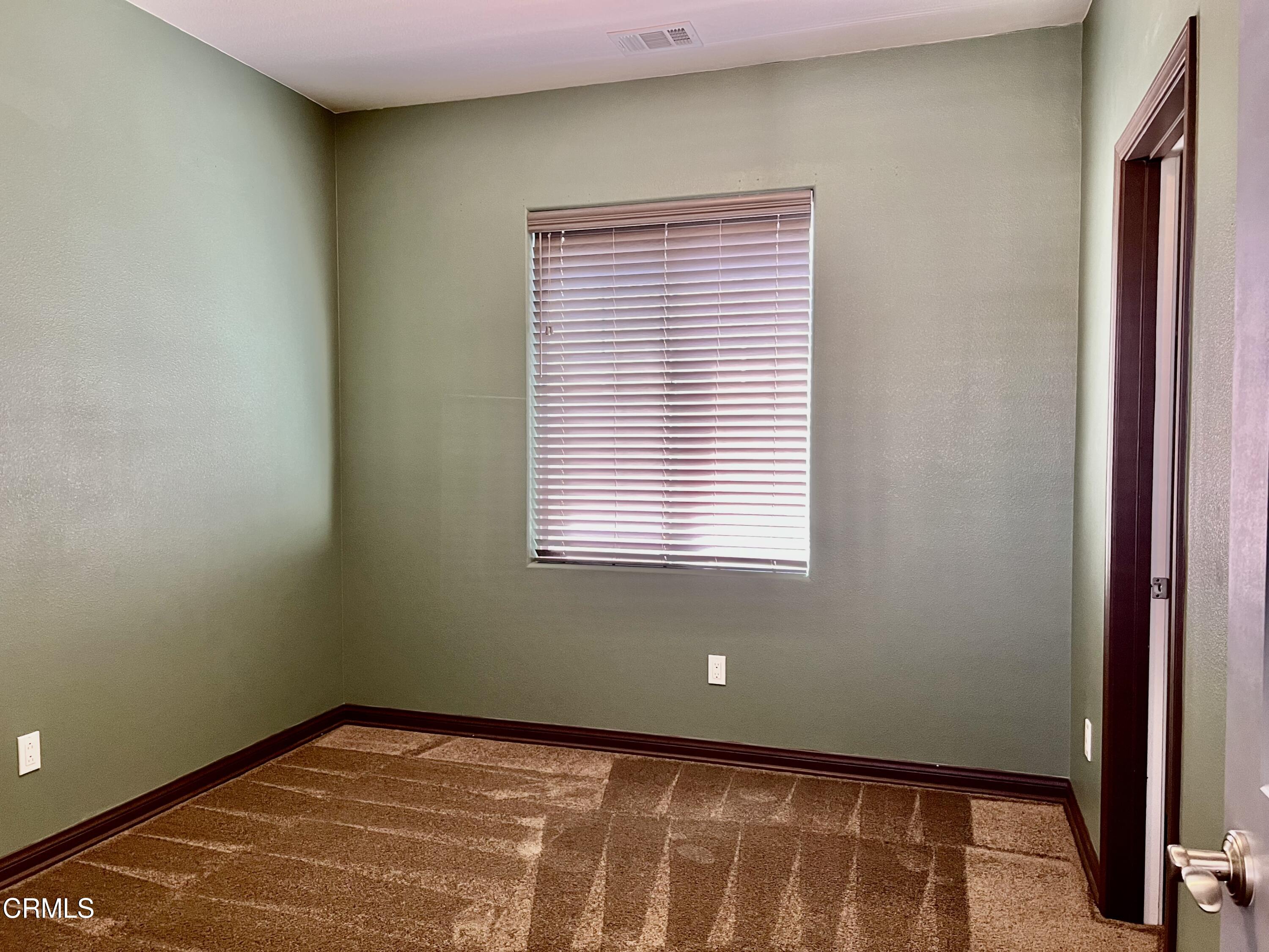 668 Owens River Drive Oxnard, CA 93036 - Photo 13 of 16 a view of an empty room with a window