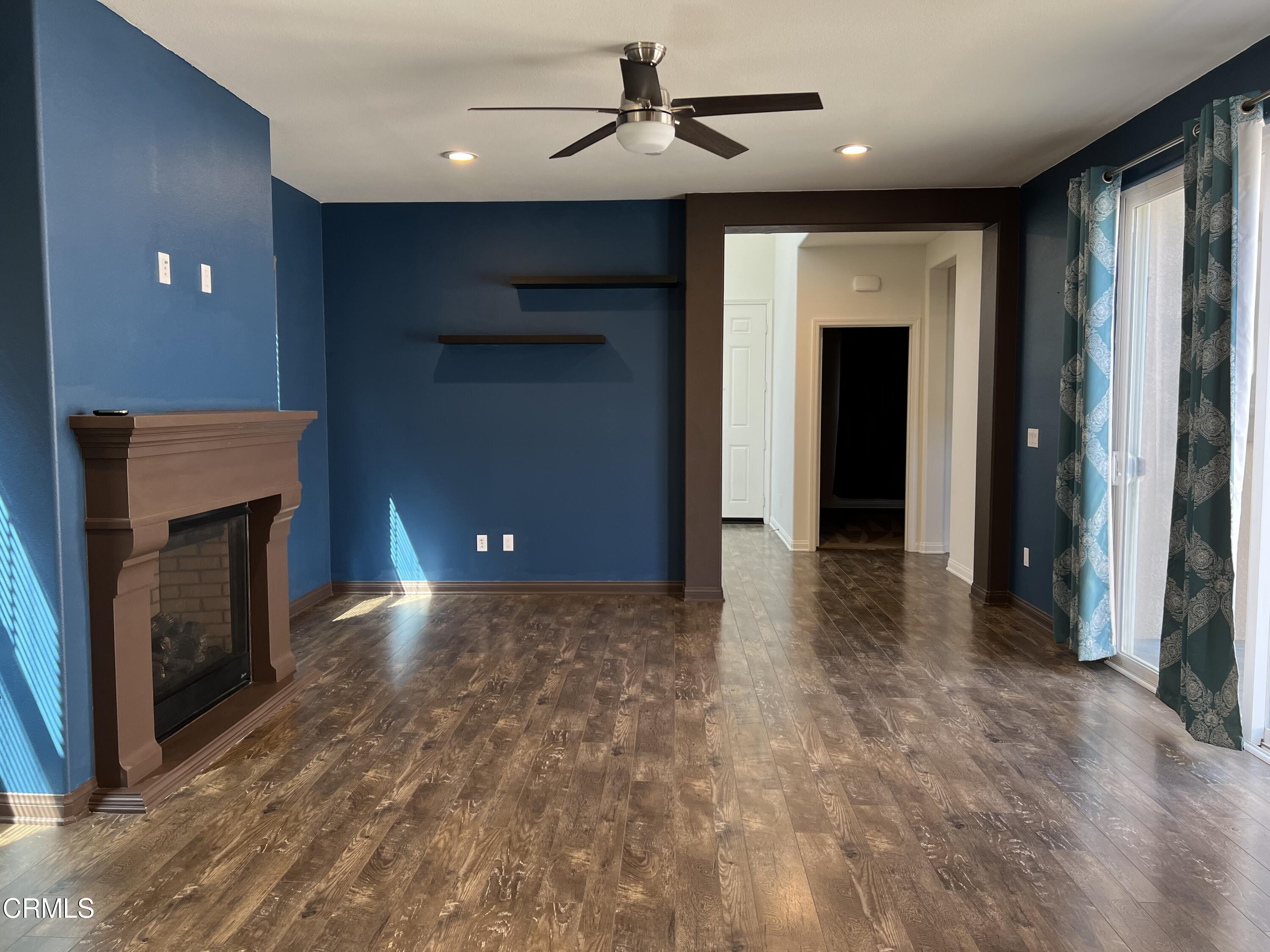 668 Owens River Drive Oxnard, CA 93036 - Photo 4 of 16 a view of a livingroom with a fireplace