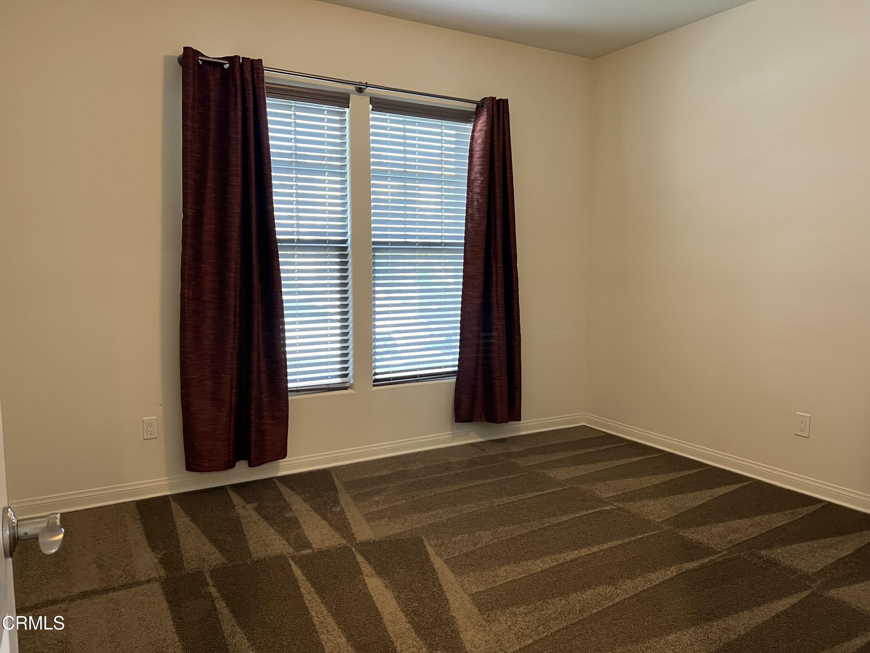 668 Owens River Drive Oxnard, CA 93036 - Photo 6 of 16 a view of an empty room with a window