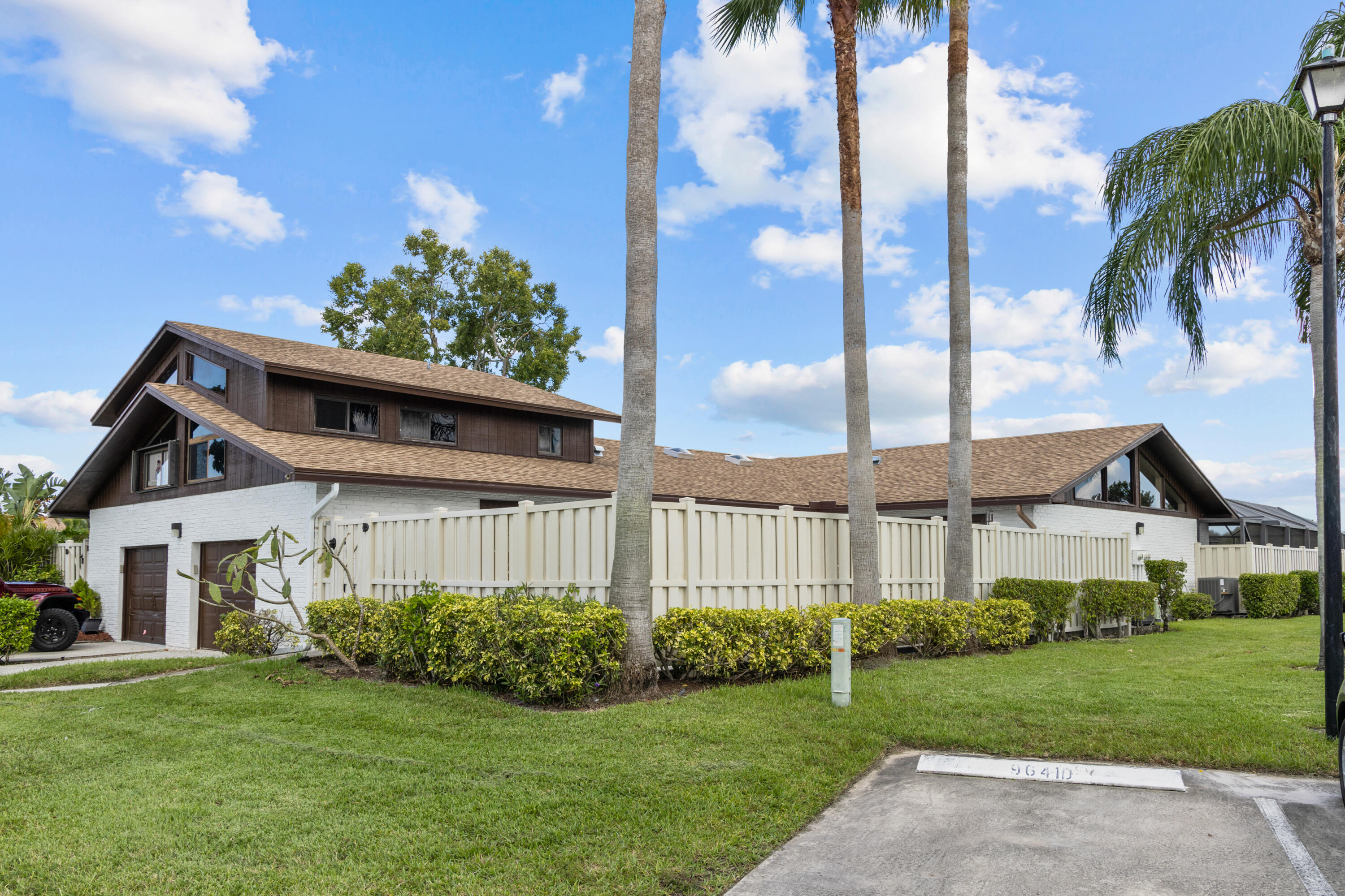 9641 Boca Gardens Parkway, Unit D Boca Raton, FL 33496 - Photo 2 of 27 Outside from parking