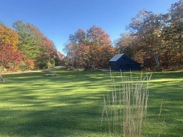 4 Solstice Way Sharon, MA 02067 - Photo 2 of 22 a view of a park with a big yard