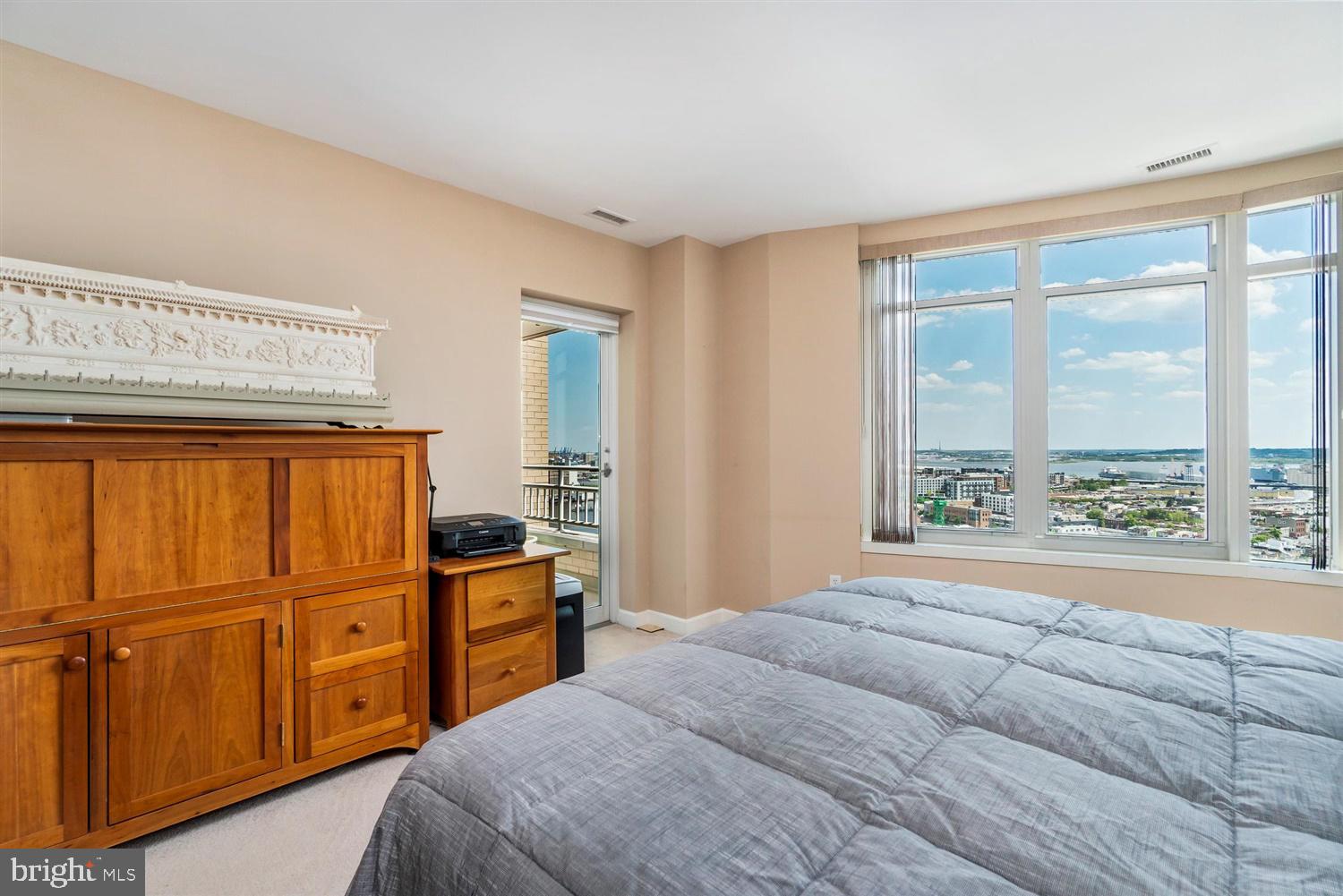 100 Harborview Drive, Unit 2104 Baltimore, MD 21230 - Photo 25 of 39 Master bedroom with balcony access