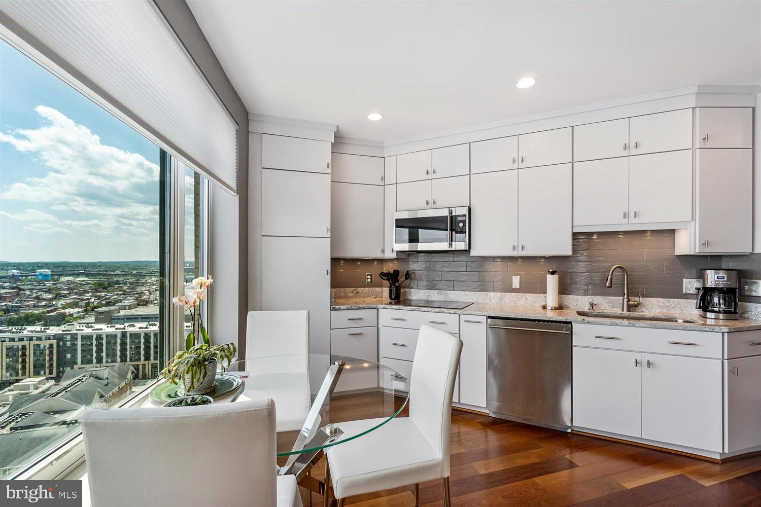 100 Harborview Drive, Unit 2104 Baltimore, MD 21230 - Photo 28 of 39 Clean contemporary white kitchen