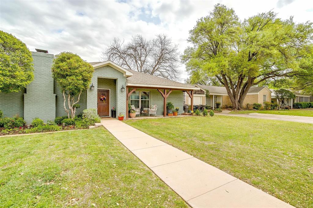 3829 Carolyn Road Fort Worth, TX 76109 - Photo 1 of 1 a front view of house with yard and green space