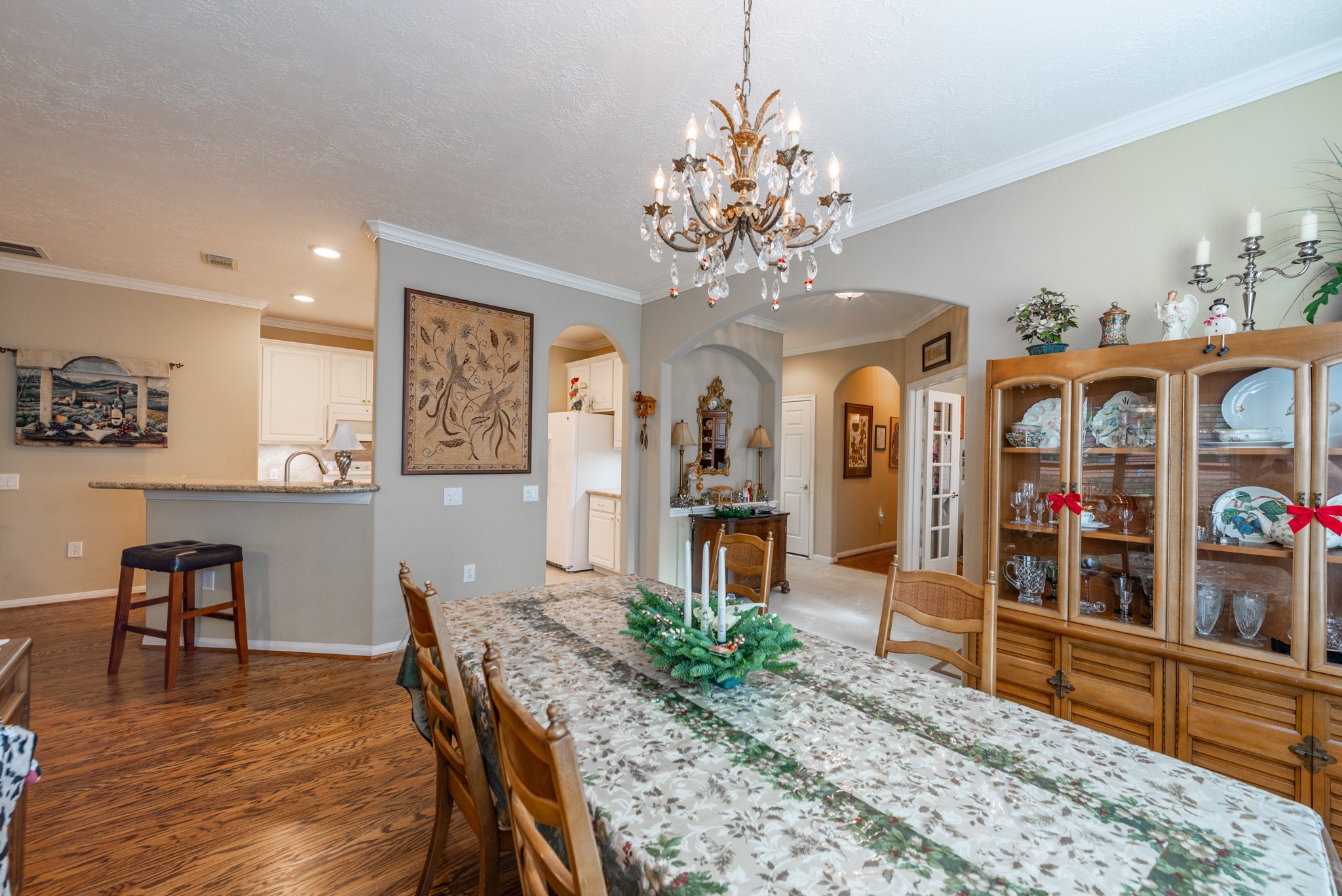 5230 Sandyfields Lane Katy, TX 77494 - Photo 11 of 24 Dining area with an open connection to the living spaces, ideal for hosting gatherings or enjoying everyday meals.