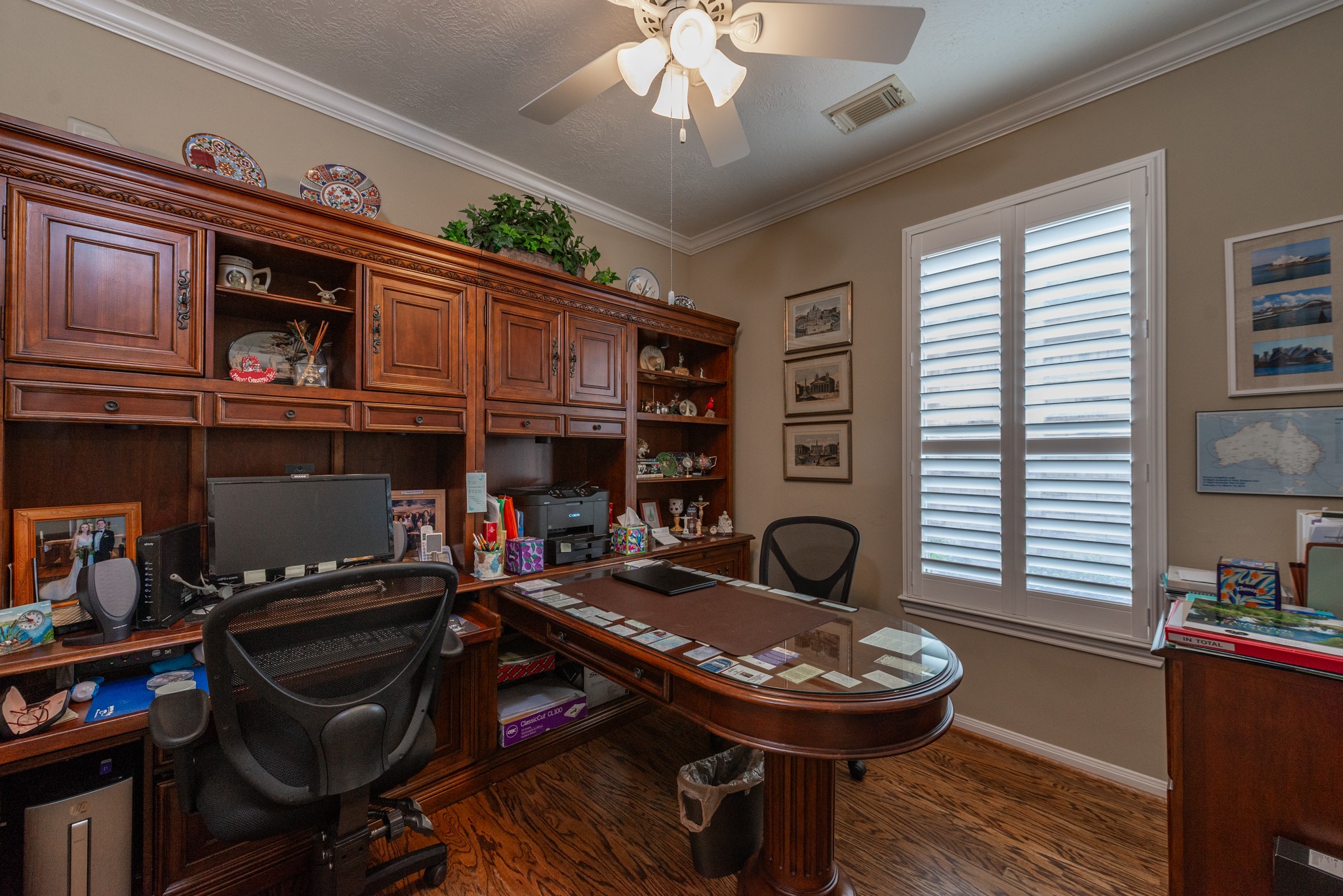5230 Sandyfields Lane Katy, TX 77494 - Photo 7 of 24 Private home office with hardwood flooring and plantation shutters, ideal for working from home or quiet reading.