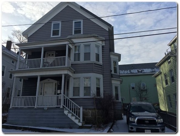 63 Cottage Street Fall River, MA 02721 - Photo 1 of 1 a front view of a house with glass windows