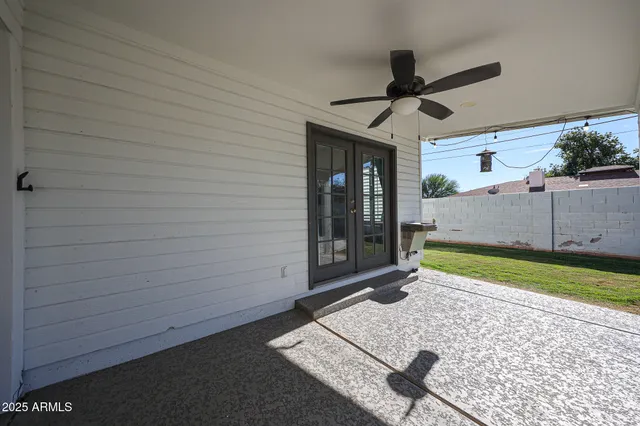 a big room with closet and windows