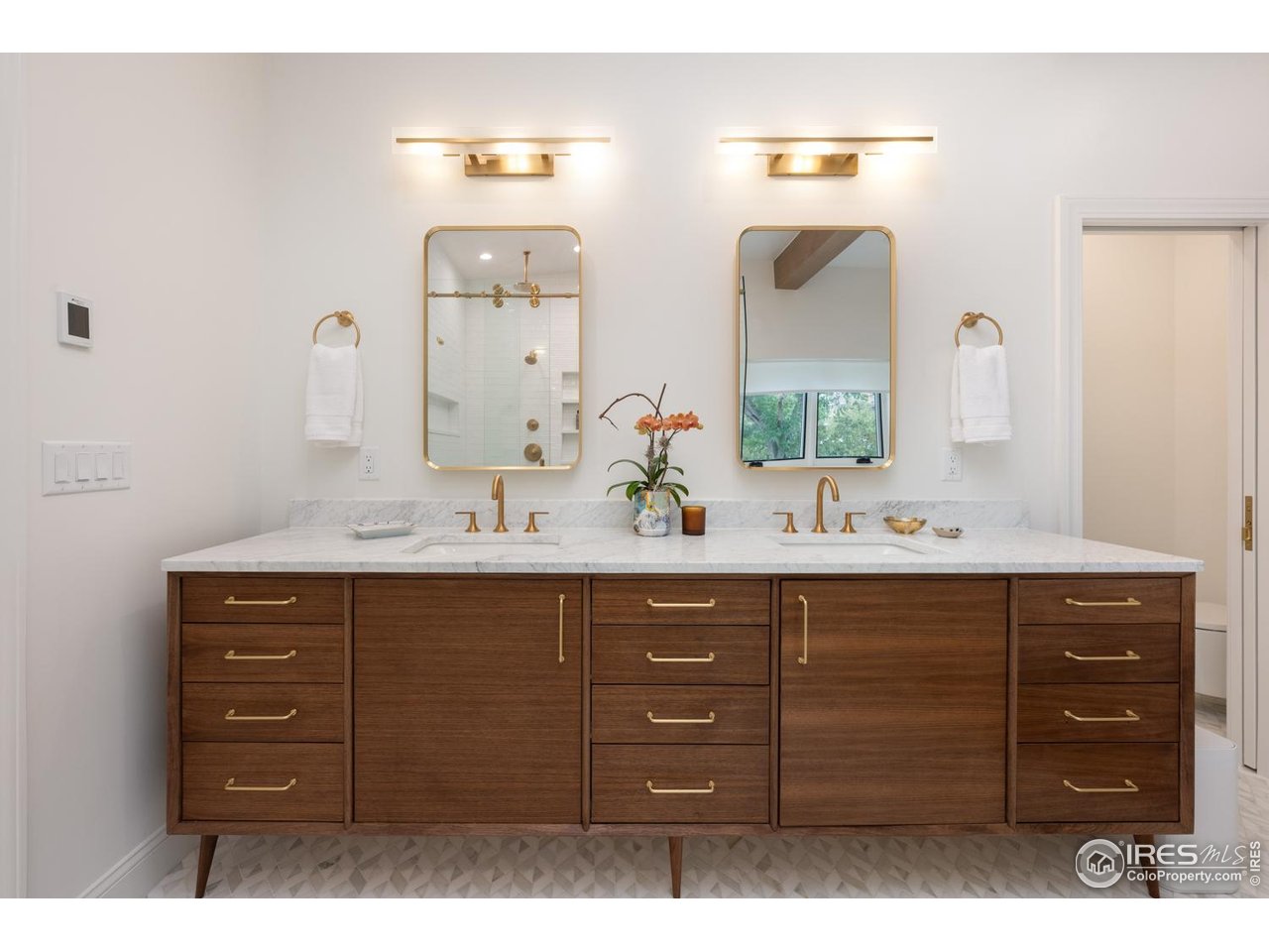 1450 High Street Boulder, CO 80304 - Photo 26 of 50 a bathroom with a sink vanity and mirror