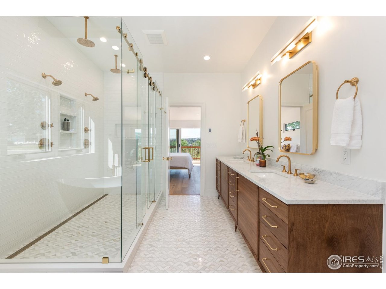 1450 High Street Boulder, CO 80304 - Photo 27 of 50 a large bathroom with a double vanity sink a mirror and a shower