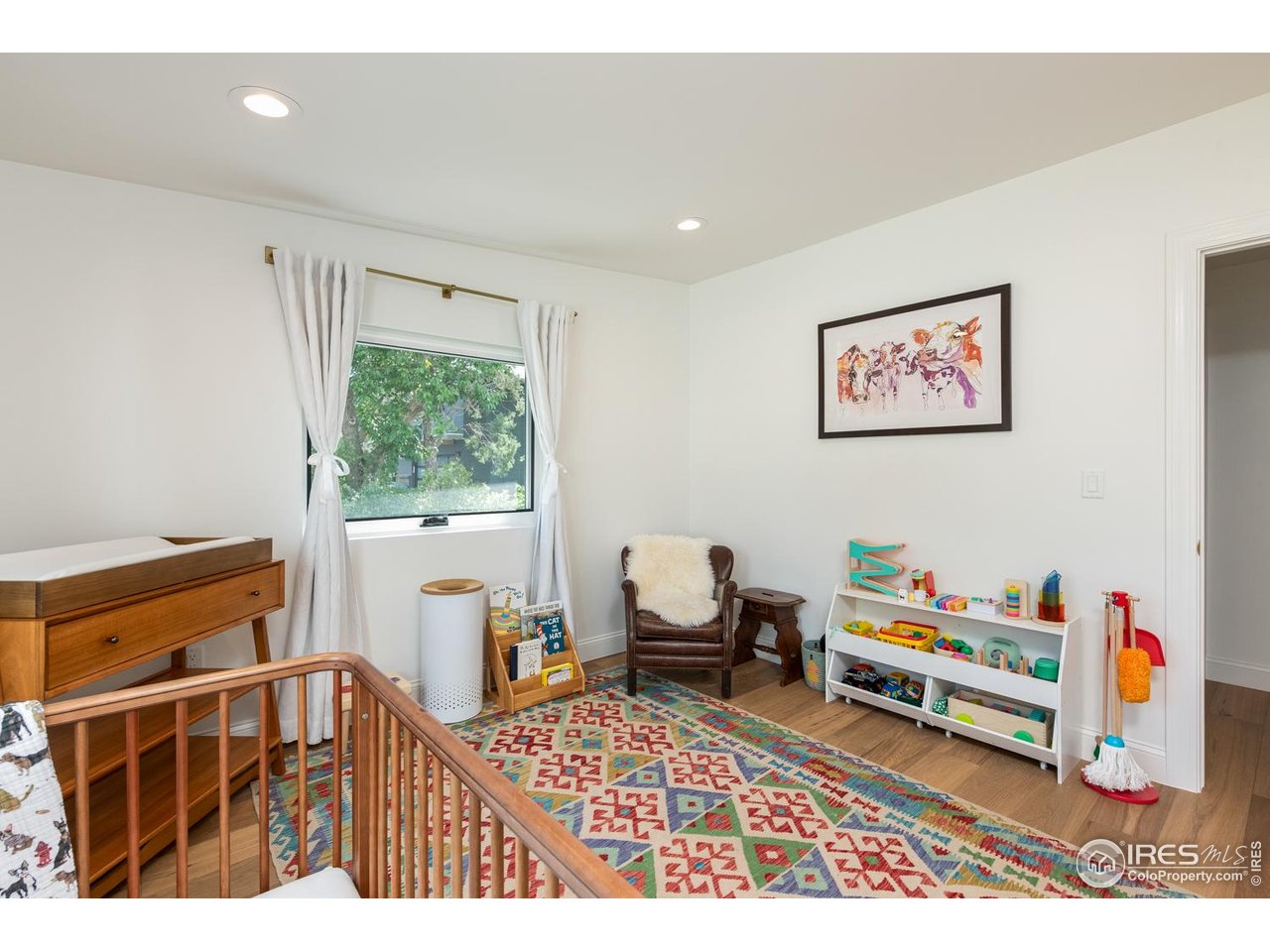 1450 High Street Boulder, CO 80304 - Photo 35 of 50 a living room with furniture and a window
