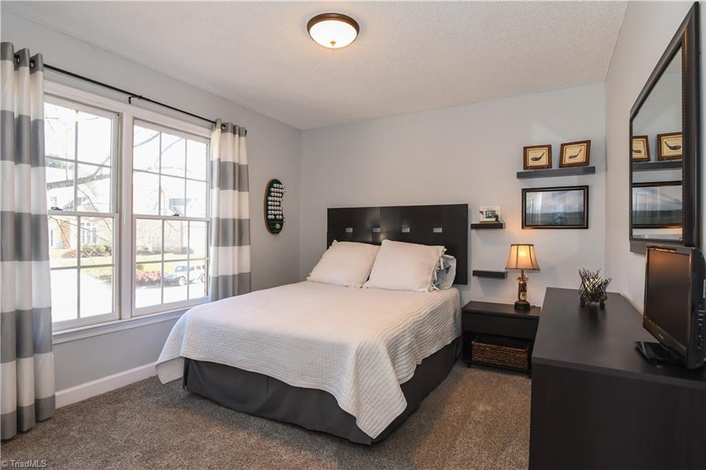 6401 High View Road Greensboro, NC 27410 - Photo 18 of 28 2nd bedroom features brand new carpet and neutral paint!