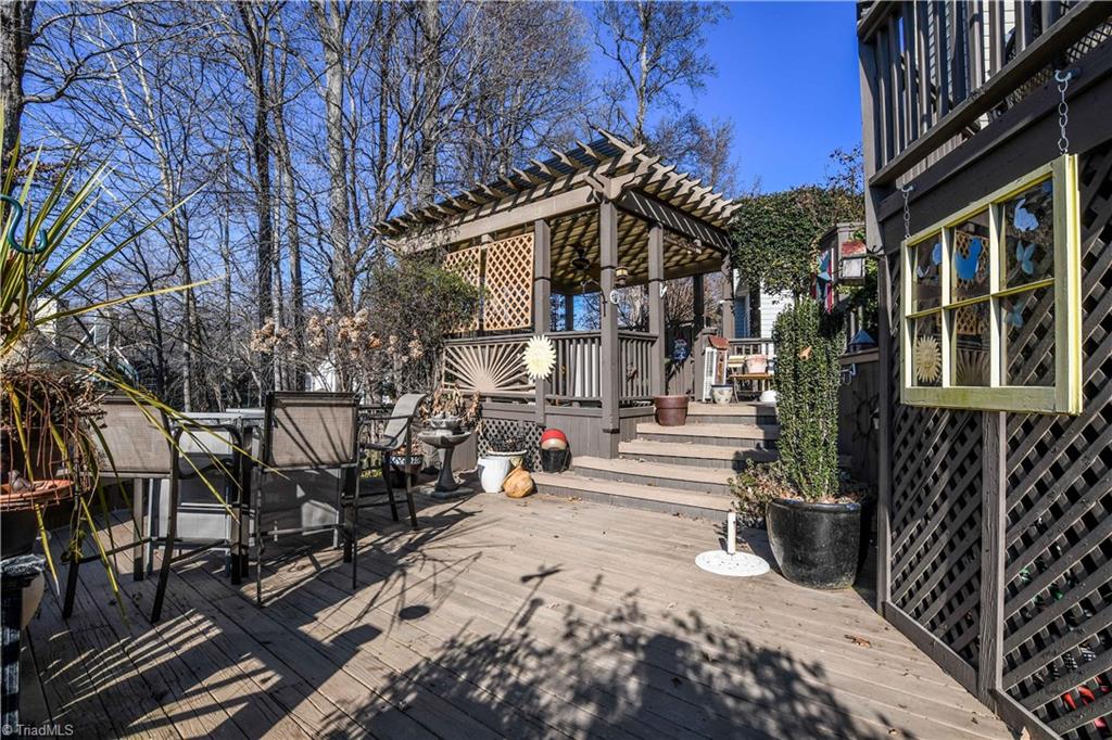 6401 High View Road Greensboro, NC 27410 - Photo 26 of 28 More decking means more area for entertaining! This home also features a fenced back yard!