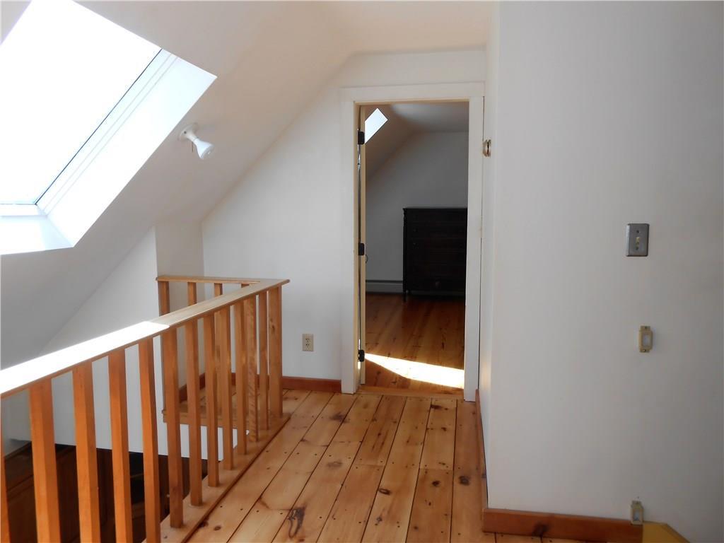 146 Southern Bay Road Penobscot, ME 04476 - Photo 11 of 19 Upstairs hallway has skylight and...