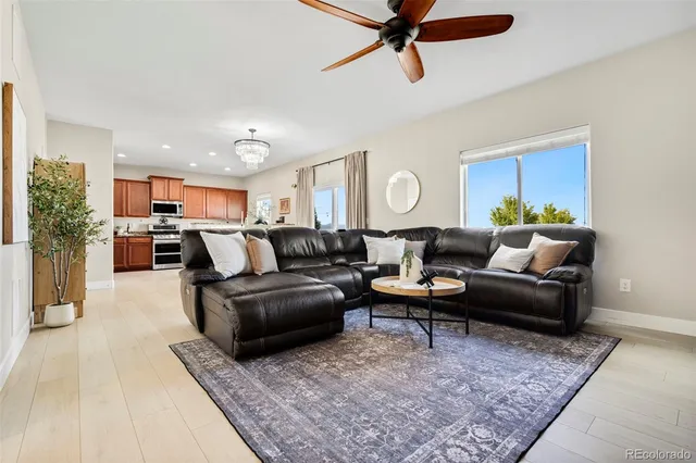 a living room with furniture and a rug