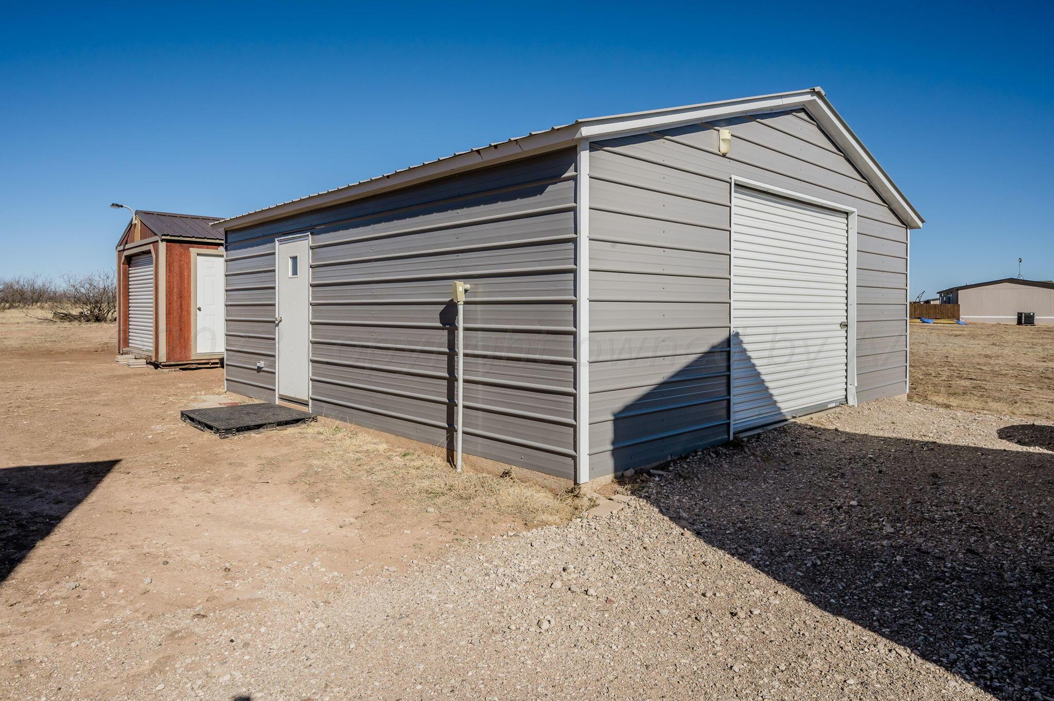 3557 Estates Drive Amarillo, TX 79124 - Photo 21 of 24 a view of a house with a backyard