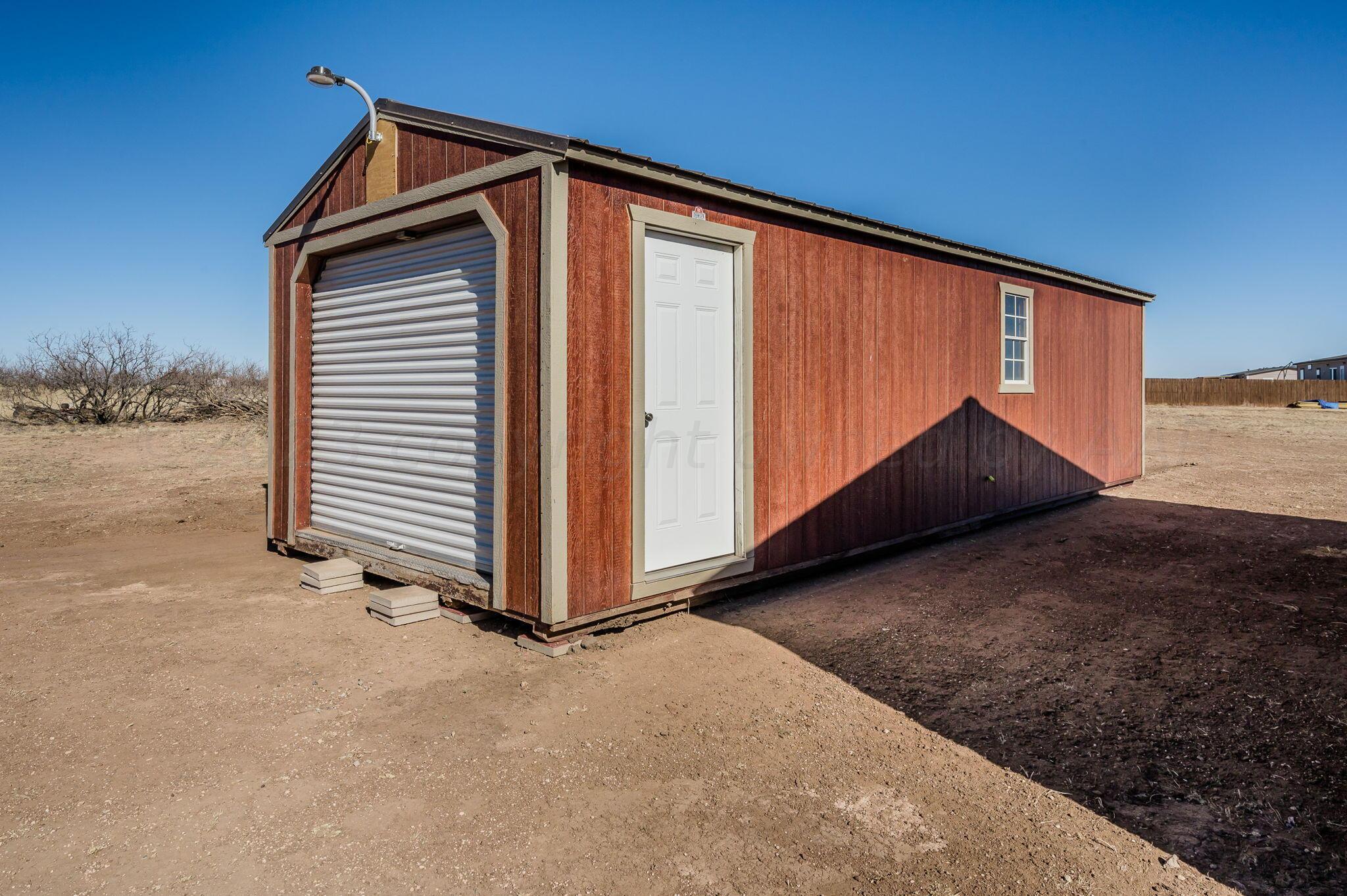 3557 Estates Drive Amarillo, TX 79124 - Photo 22 of 24 a view of a house with backyard and wooden fence