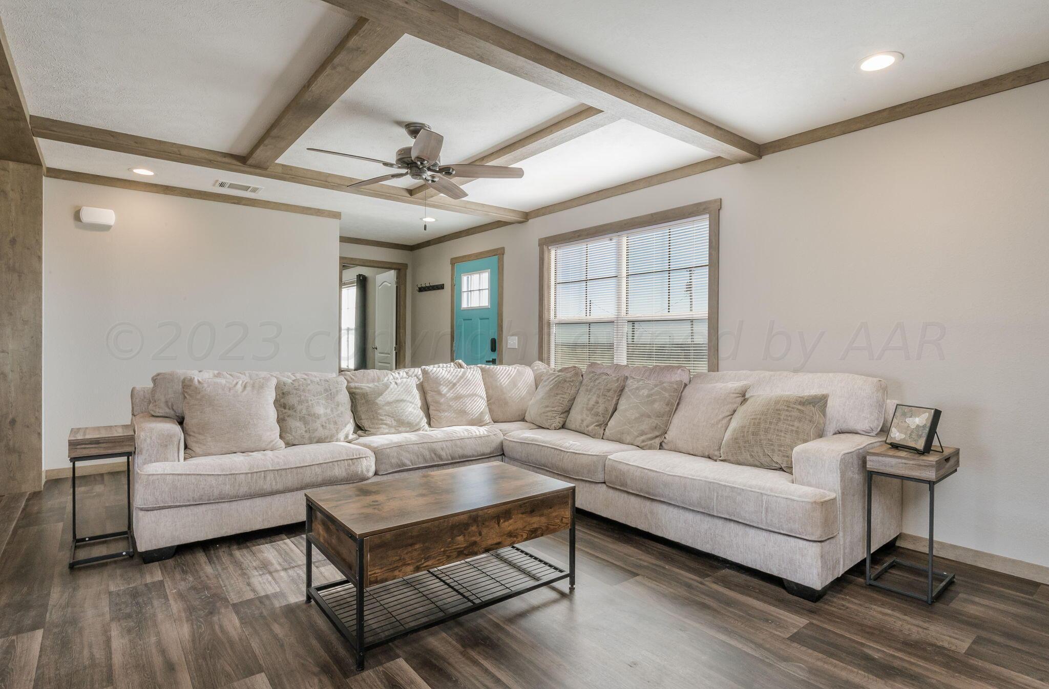 3557 Estates Drive Amarillo, TX 79124 - Photo 4 of 24 a living room with furniture and a large window