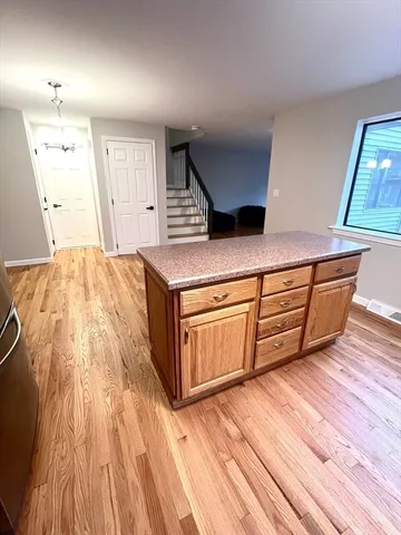 a living room with wooden floors and a wooden floors