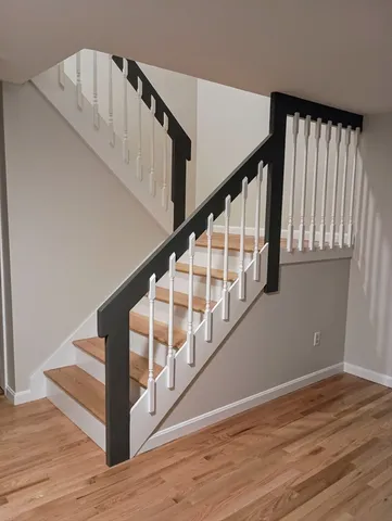 a view of entryway with wooden floor