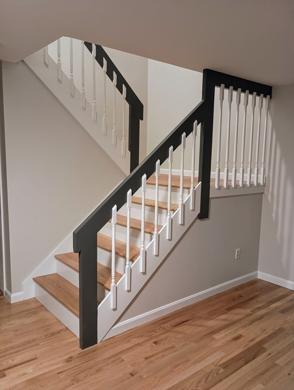 123 Chapin Road, Unit 1A4 Hudson, MA 01749 - Photo 17 of 32 a view of entryway with wooden floor