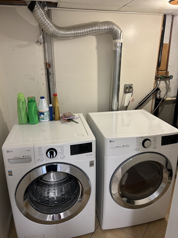 123 Chapin Road, Unit 1A4 Hudson, MA 01749 - Photo 27 of 32 a utility room with dryer and washer