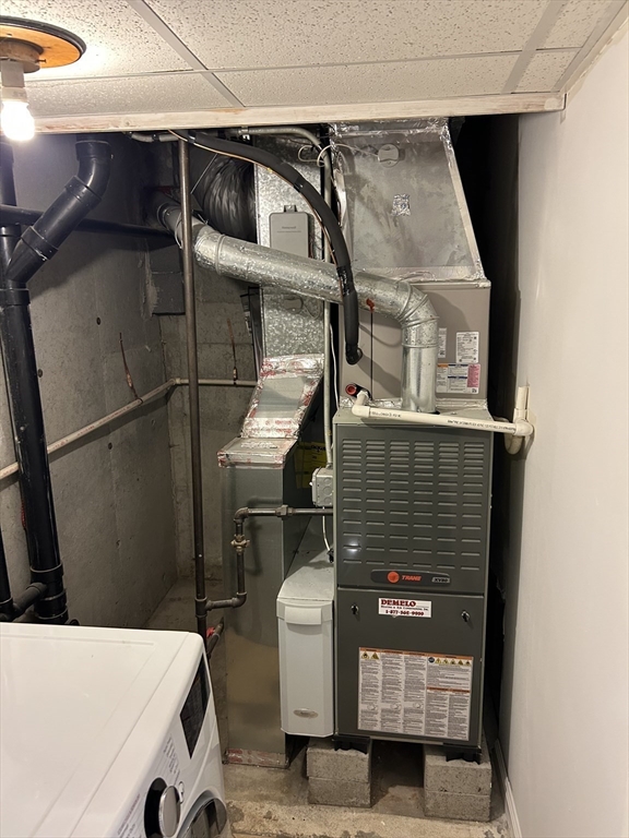 123 Chapin Road, Unit 1A4 Hudson, MA 01749 - Photo 28 of 32 a bathroom with a sink and mirror