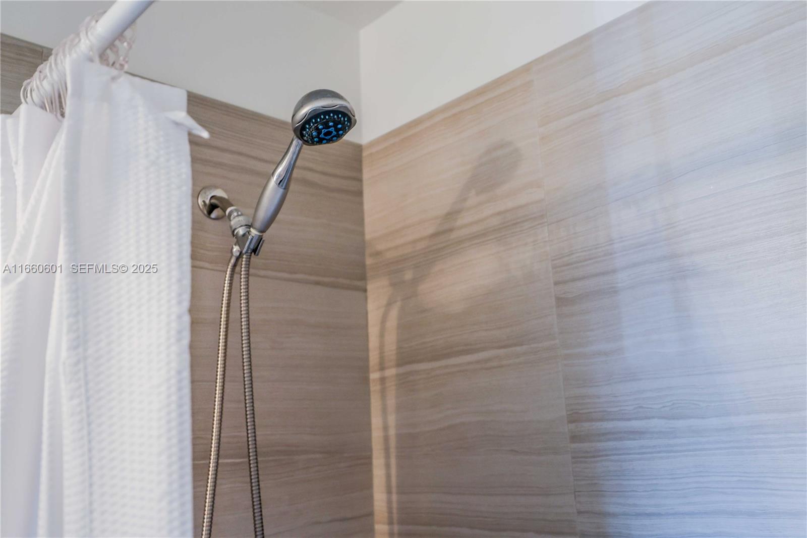 446 Southwest 113th Way, Unit 446 Pembroke Pines, FL 33025 - Photo 22 of 39 a bathroom with a shower