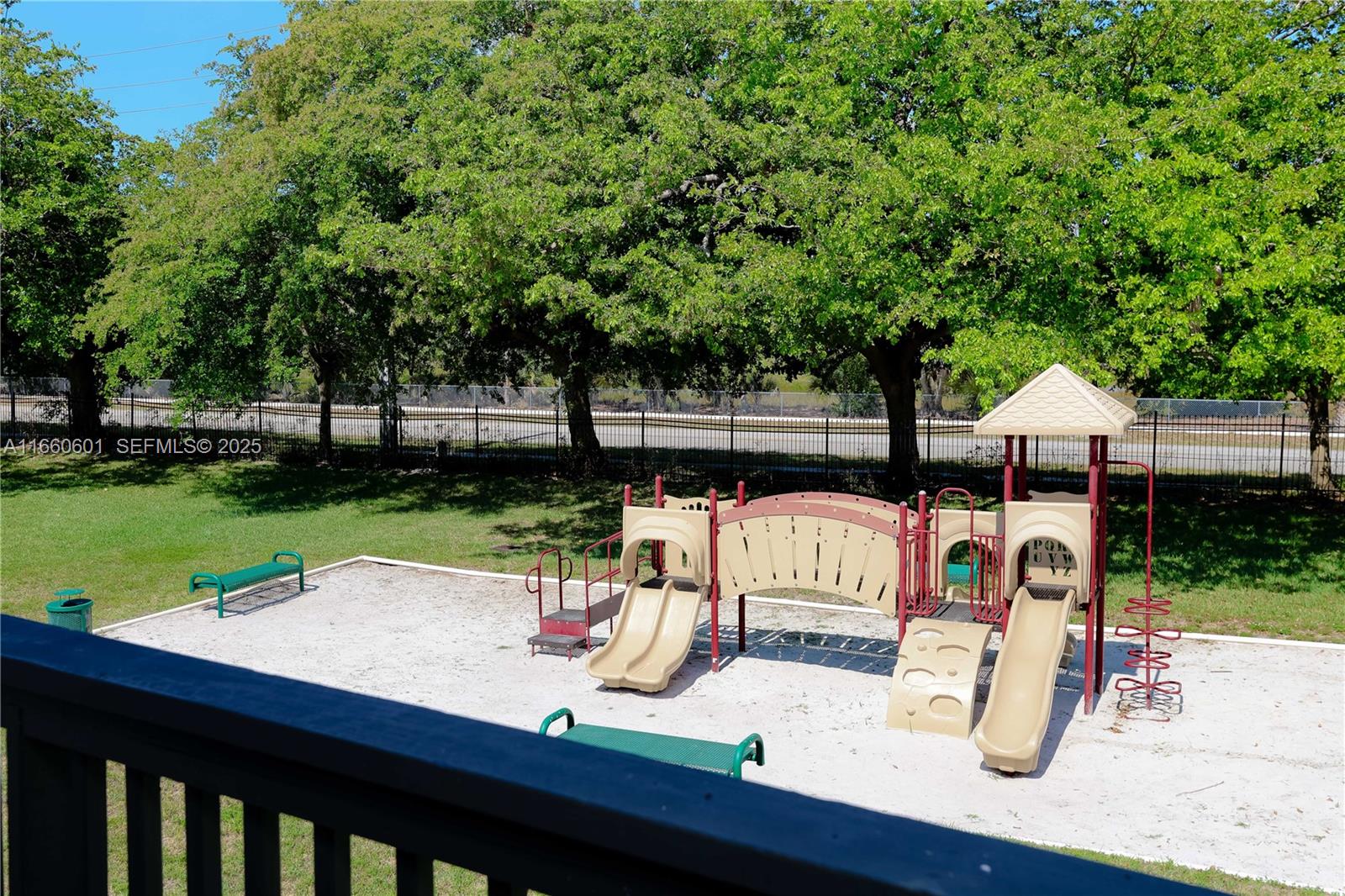 446 Southwest 113th Way, Unit 446 Pembroke Pines, FL 33025 - Photo 27 of 39 a view of house with backyard outdoor seating and green space