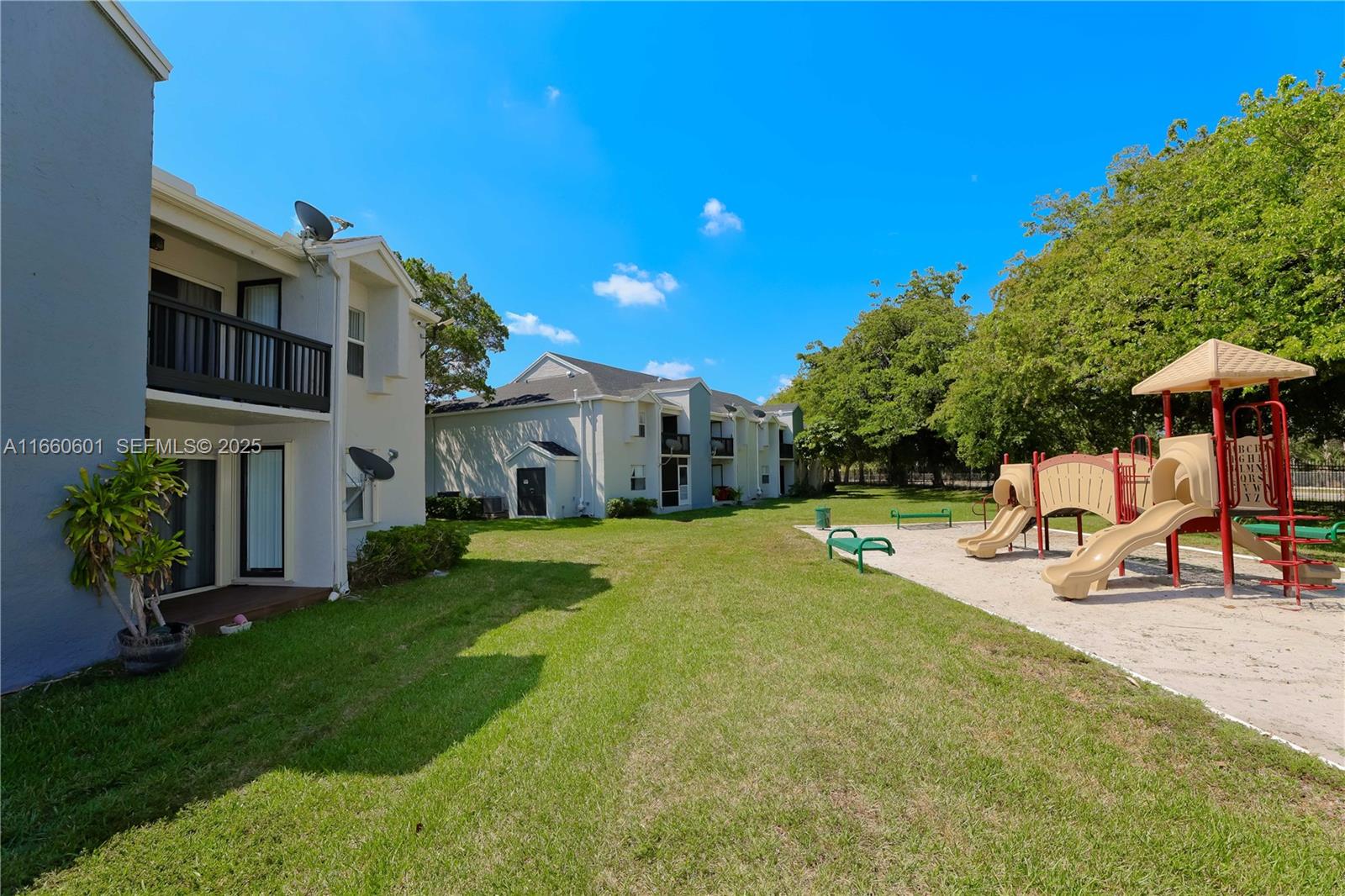 446 Southwest 113th Way, Unit 446 Pembroke Pines, FL 33025 - Photo 29 of 39 a view of a house with backyard porch and sitting area