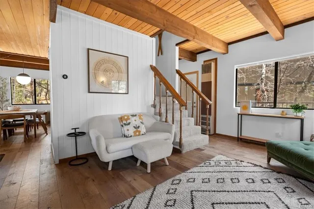 a living room with furniture and a table
