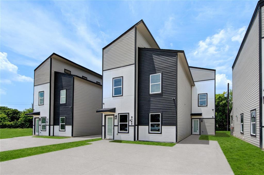 8159 Tate, Unit B Houston, TX 77028 - Photo 1 of 16 a front view of house with yard and green space