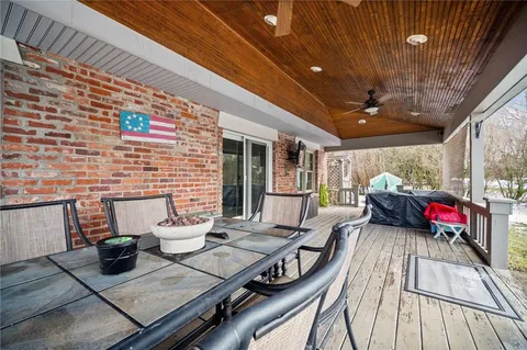 a view of a hallway with staircase
