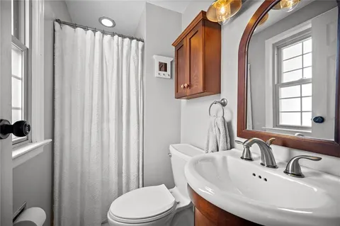 a view of a hallway with washer and dryer
