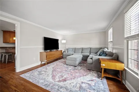 a bathroom with a sink a mirror and a window