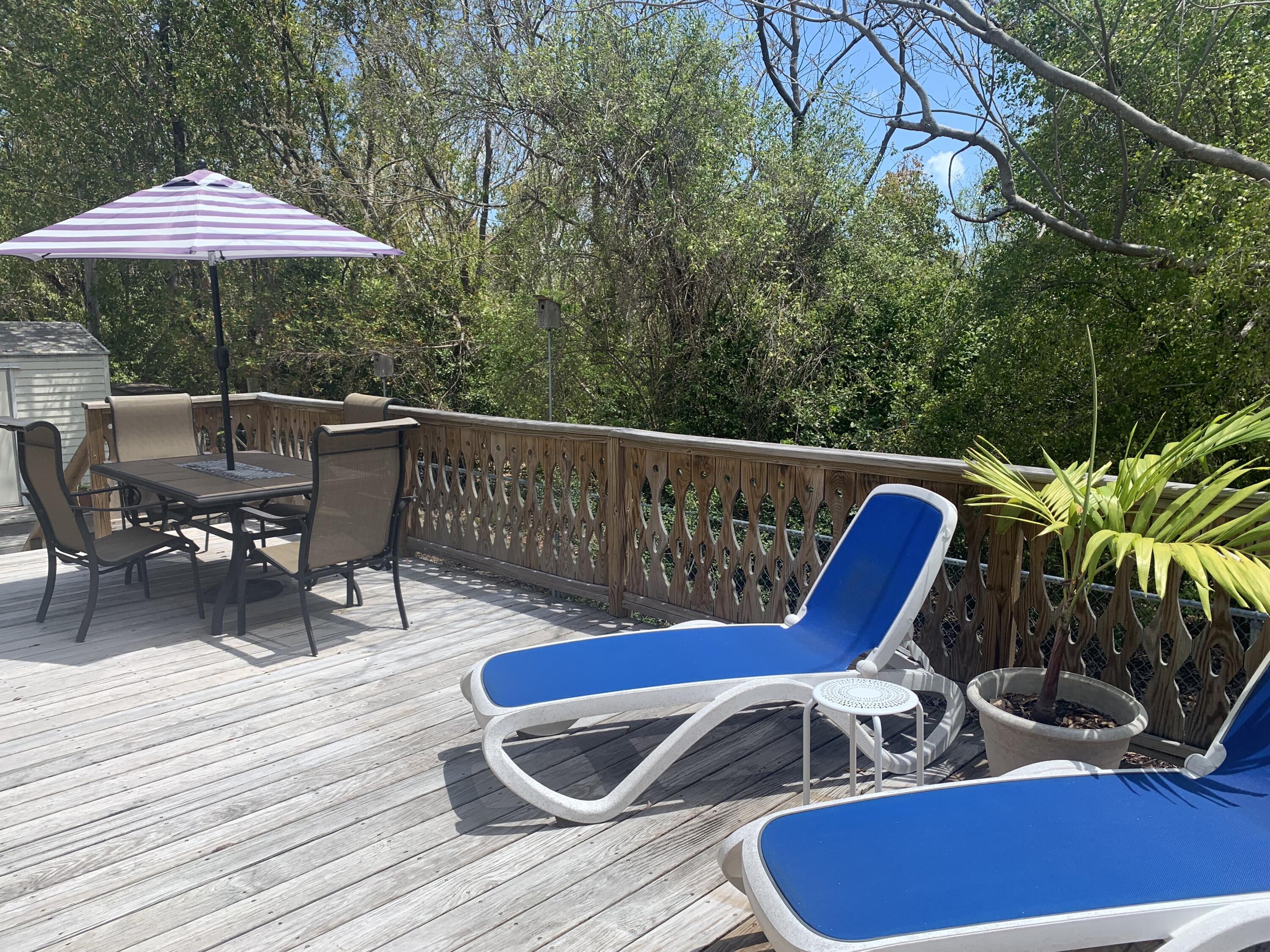 150 Sunshine Boulevard Tavernier, FL 33070 - Photo 2 of 26 a view of balcony with outdoor seating
