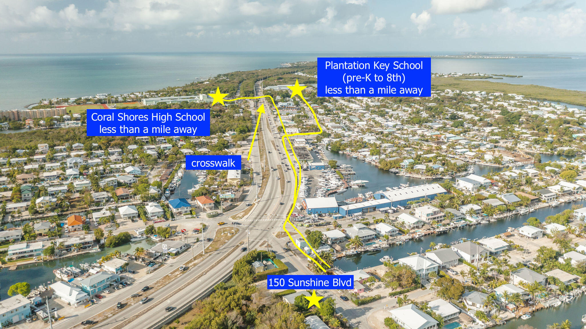 150 Sunshine Boulevard Tavernier, FL 33070 - Photo 20 of 26 a sign that is sitting on a brick wall