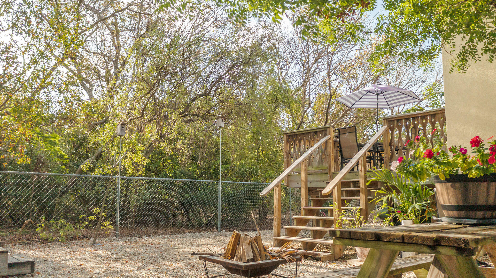 150 Sunshine Boulevard Tavernier, FL 33070 - Photo 22 of 26 a view of balcony with two potted plants
