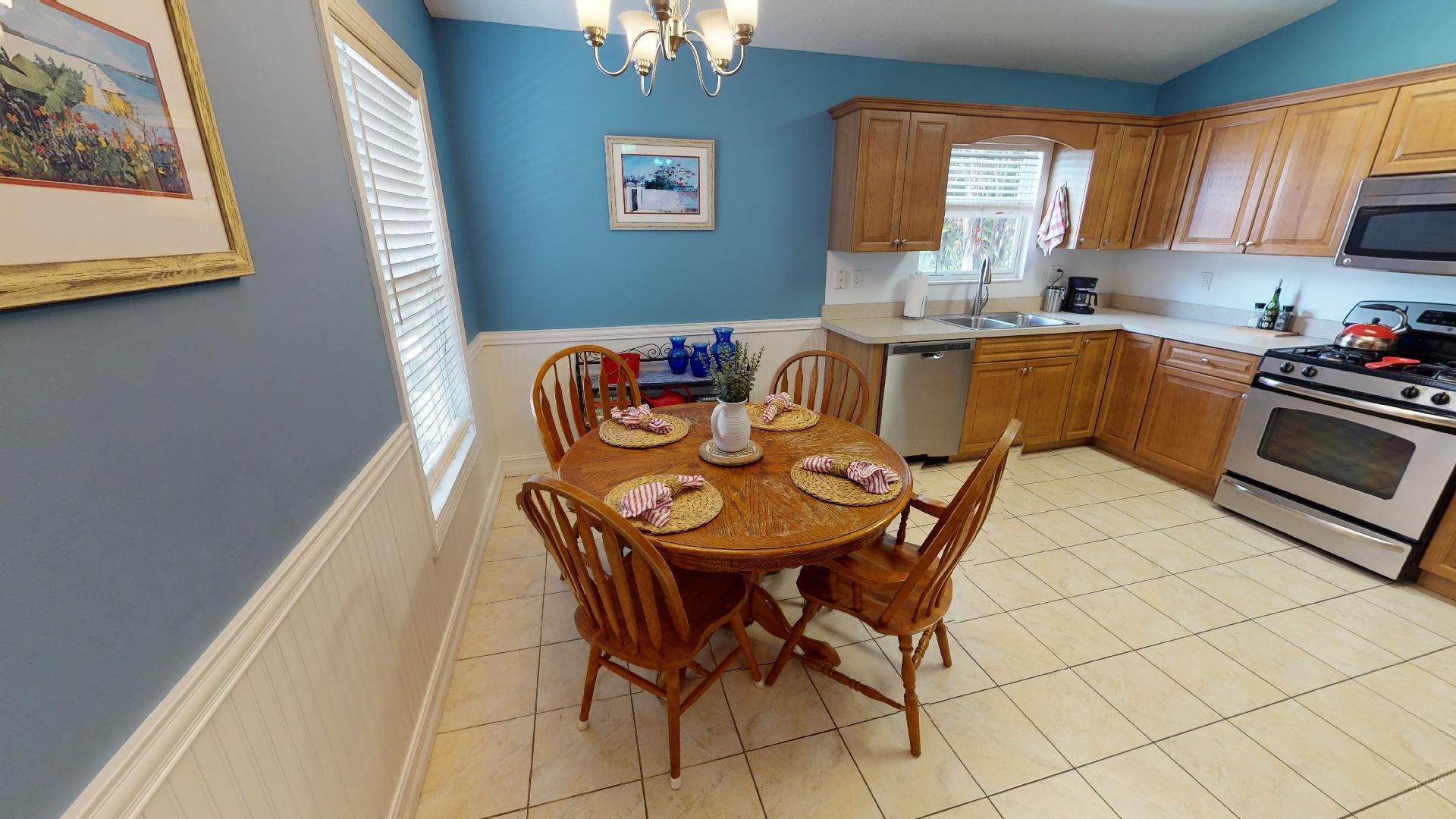 150 Sunshine Boulevard Tavernier, FL 33070 - Photo 7 of 26 a view of a dining room with furniture