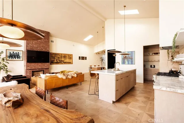 a living room with furniture and flat screen tv
