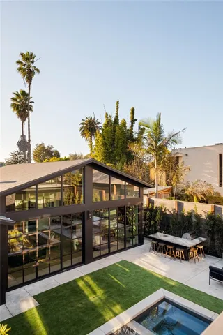 a view of a house with a swimming pool
