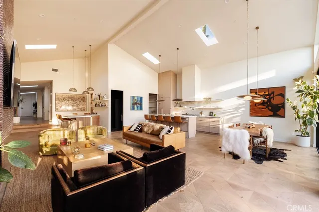 a view of a living room and dining room