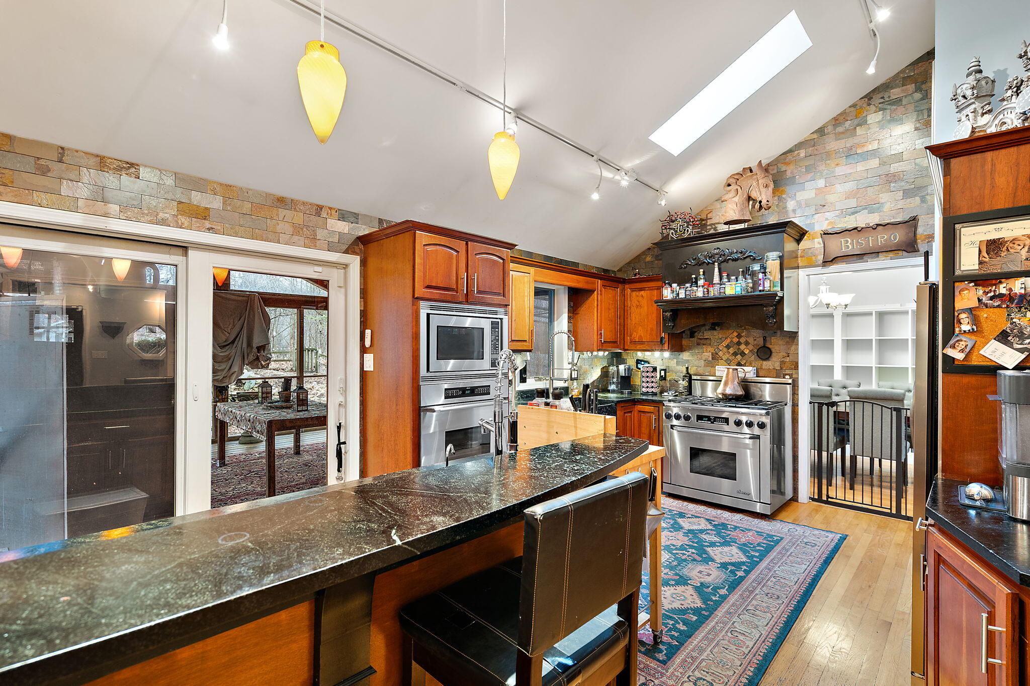 733 South Indiana Avenue Griffith, IN 46319 - Photo 11 of 48 a large kitchen with stainless steel appliances and large counter space