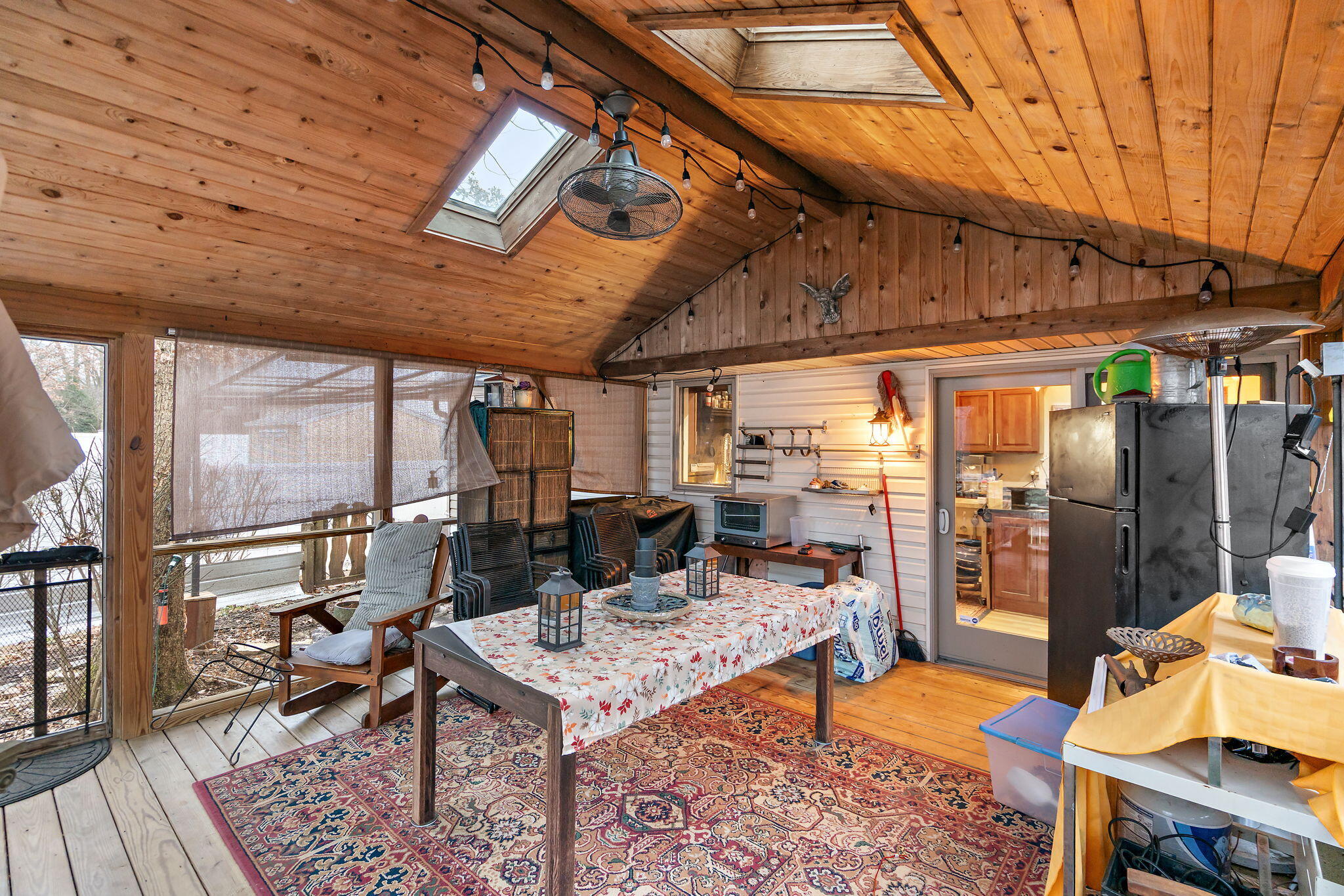 733 South Indiana Avenue Griffith, IN 46319 - Photo 16 of 48 a view of a patio with table and chairs a barbeque