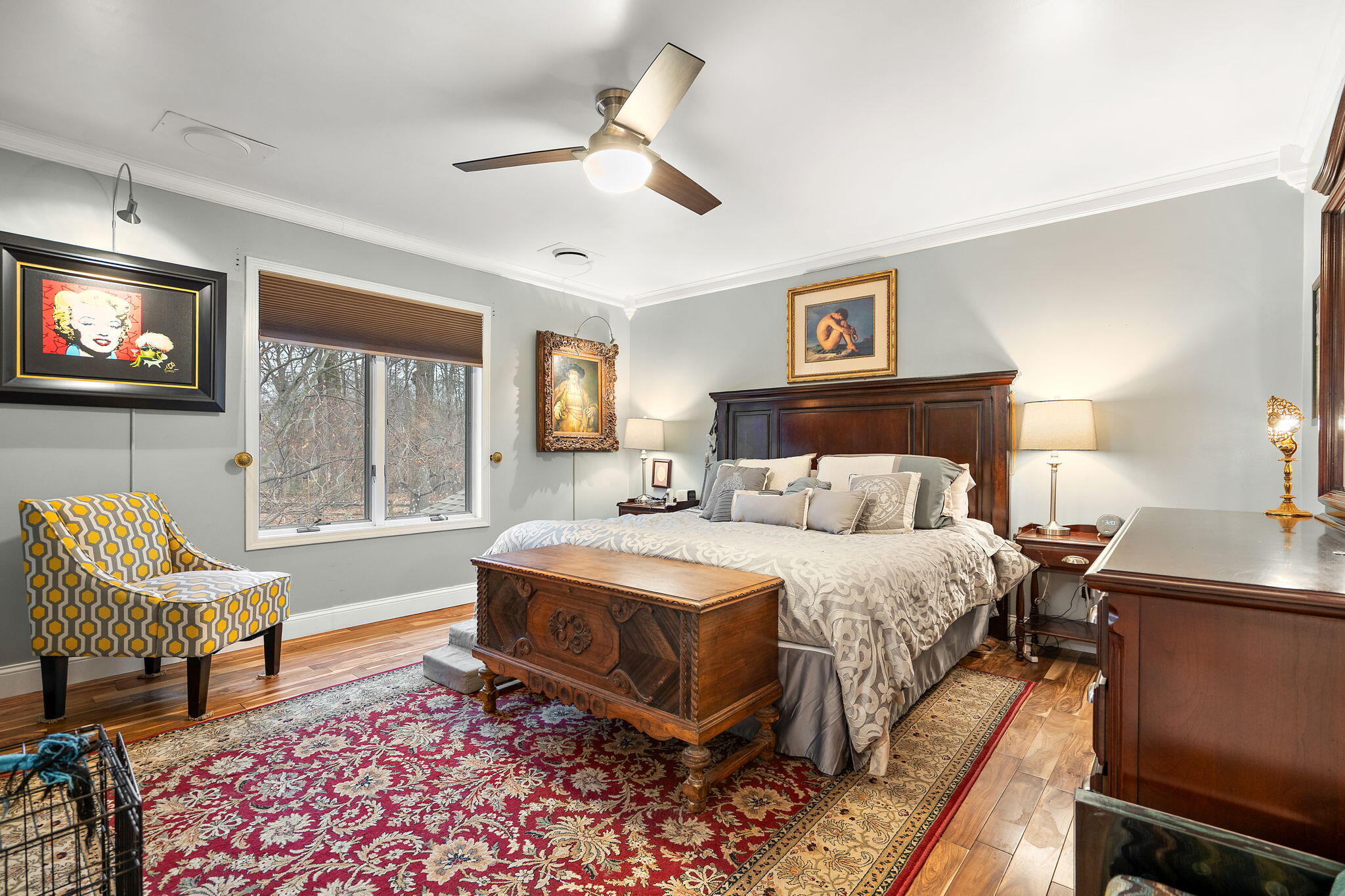 733 South Indiana Avenue Griffith, IN 46319 - Photo 18 of 48 a spacious bedroom with a bed a flat screen tv and windows