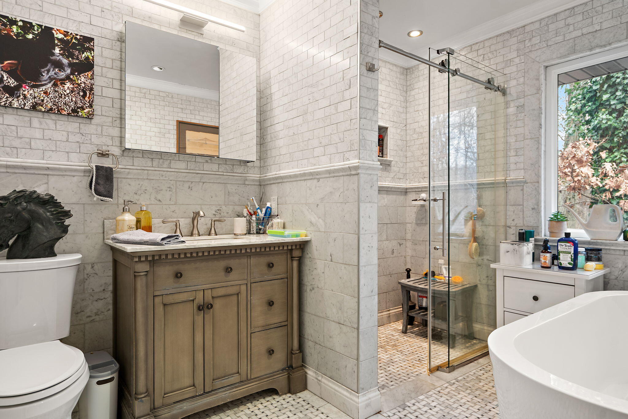 733 South Indiana Avenue Griffith, IN 46319 - Photo 19 of 48 a bathroom with a sink toilet a tub and shower