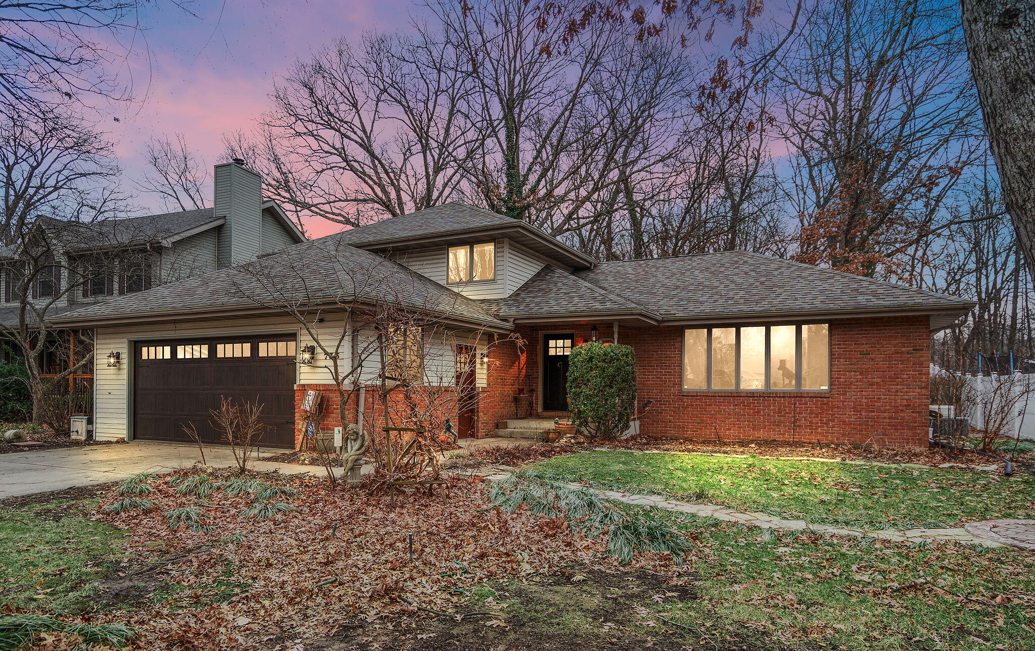 733 South Indiana Avenue Griffith, IN 46319 - Photo 2 of 48 a front view of a house with garden