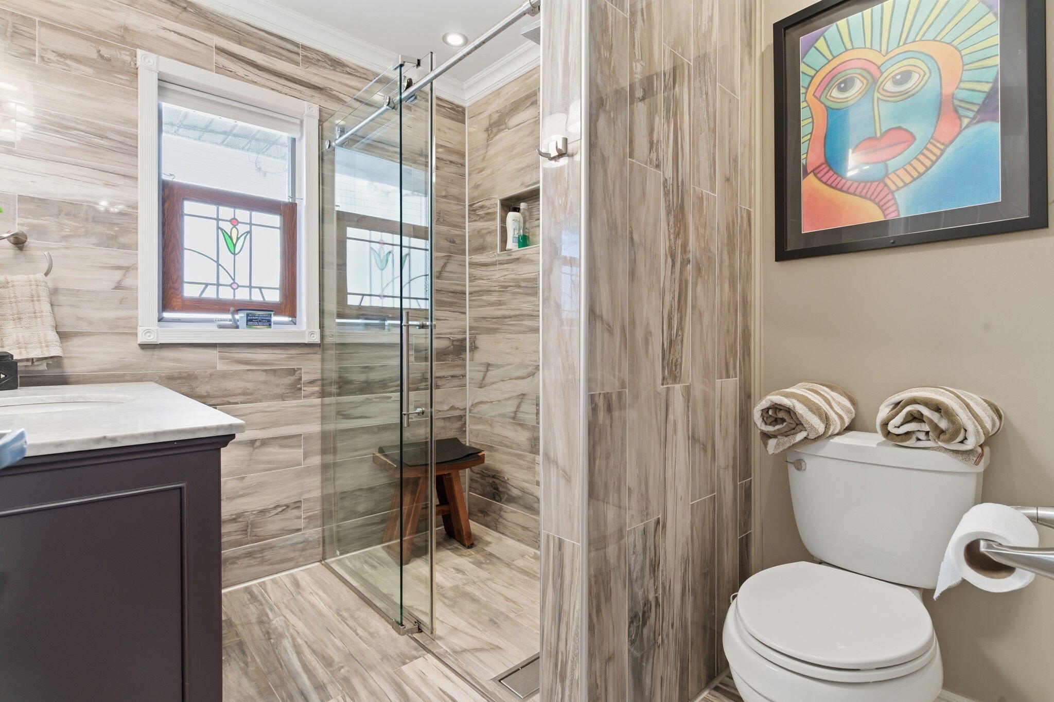 733 South Indiana Avenue Griffith, IN 46319 - Photo 23 of 48 a bathroom with a toilet a sink and a shower