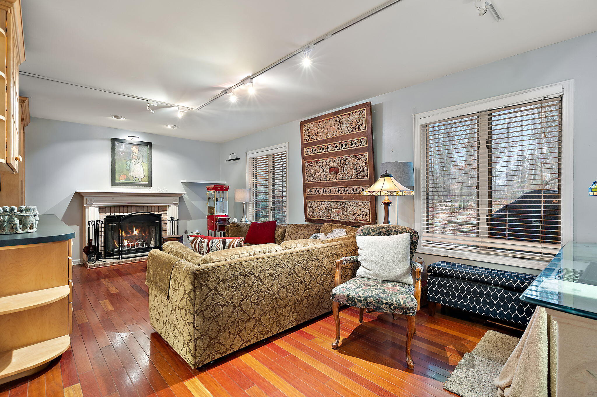 733 South Indiana Avenue Griffith, IN 46319 - Photo 27 of 48 a living room with furniture and a fireplace
