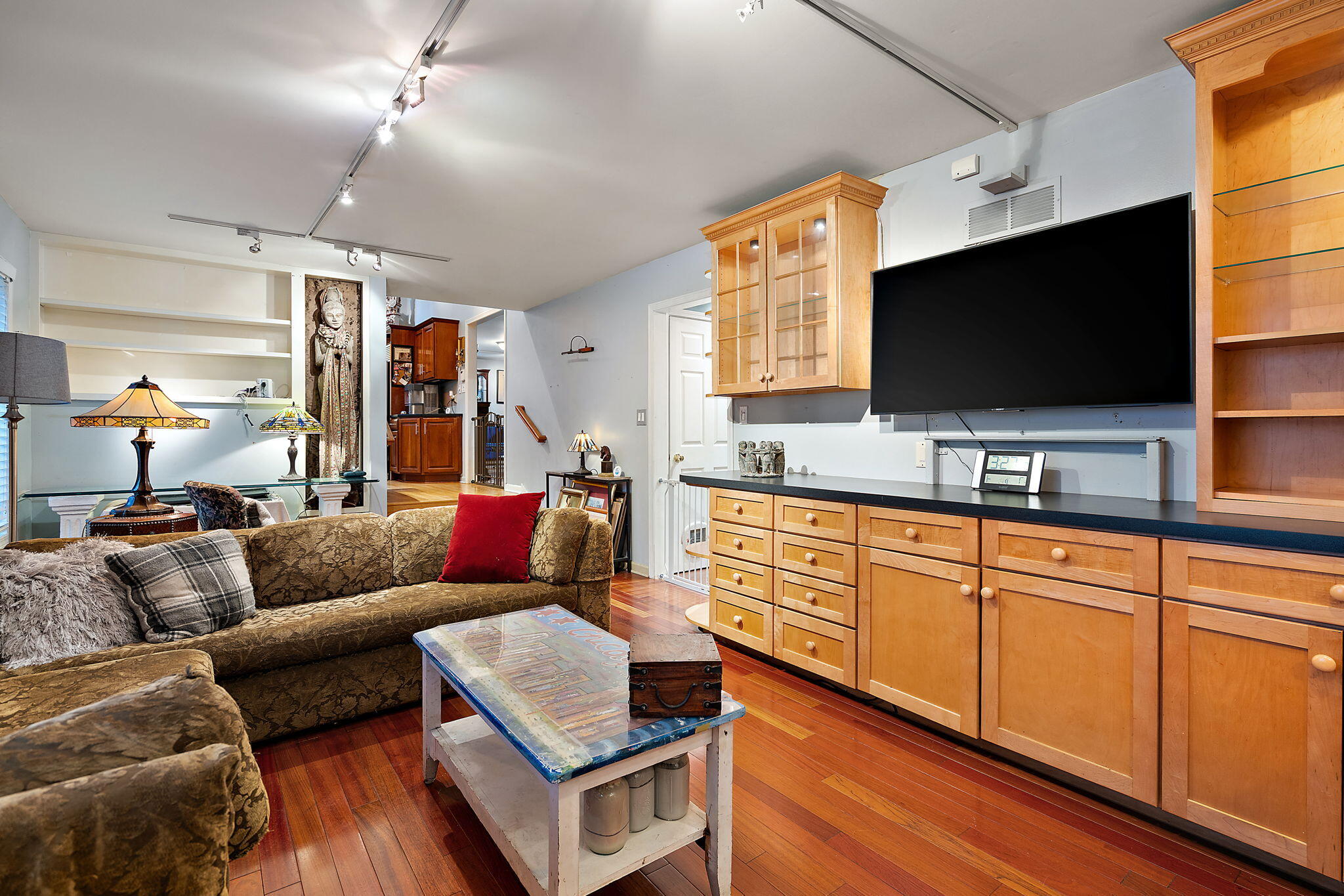 733 South Indiana Avenue Griffith, IN 46319 - Photo 29 of 48 a living room with furniture and a flat screen tv